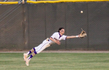 Lemoore's outfielder Dominick Najar makes a diving catch and doubled up a runner at second base for a key out.